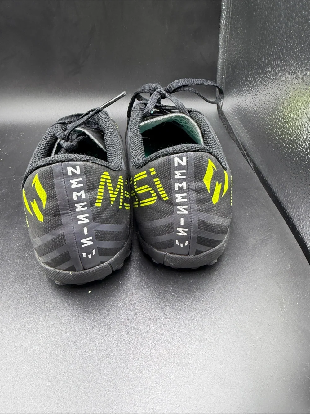 adidas Kids Black Soccer Sneakers with White Stripes and Neon Yellow Accents